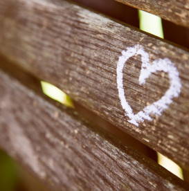 white-heart-on-wood-bench-selfless