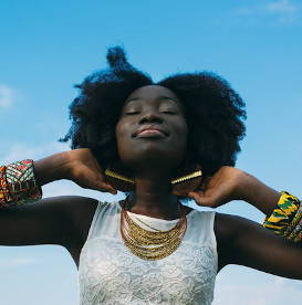 happy-woman-wearing-african-jewelry